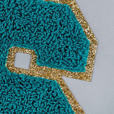 Chenille S patch close up
