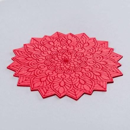 Coral Faux Suede Leather mandala patch laid at a hard angle