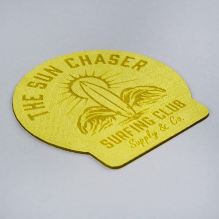 Wild Lime Faux Suede Leather surfing club patch laid at a hard angle