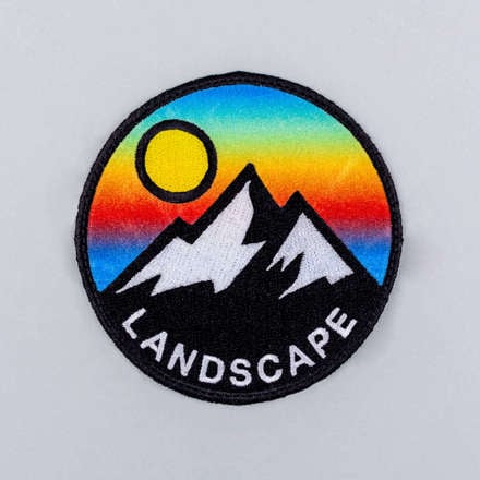 Print Stitch mountain landscape patch laid flat