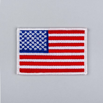 Embroidered American Flag Patch with white border laid flat