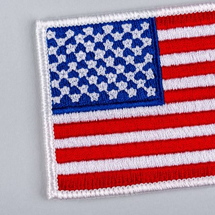 Embroidered American Flag Patch with white border close up