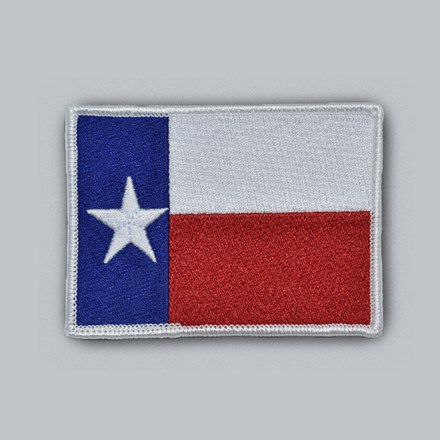 Embroidered Texas Flag Patch with white border laid flat