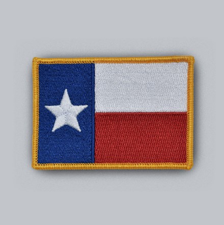 Embroidered Texas Flag Patch with yellow border laid flat