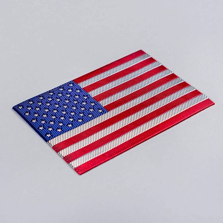 FlexStyle Metallic American Flag emblem laid at a hard angle