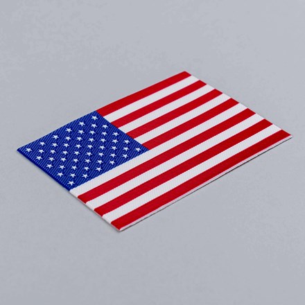 FlexStyle Non-Metallic American Flag emblem laid at a hard angle