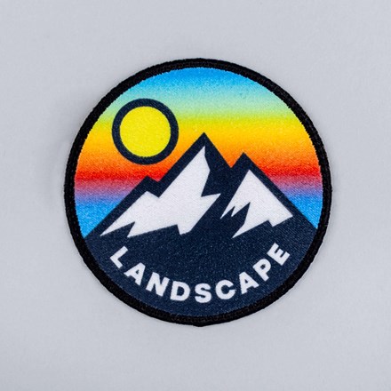 Sublimated Faux Suede mountain landscape patch laid flat