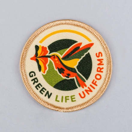 Sublimated Green Life Uniforms patch laid flat