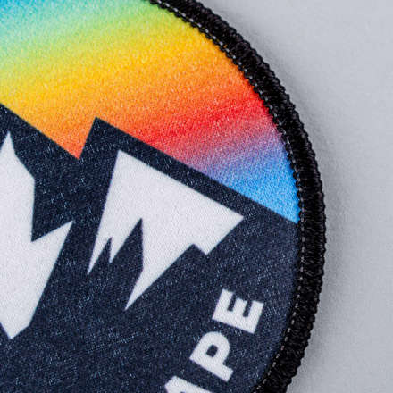 Sublimated mountain landscape patch close up