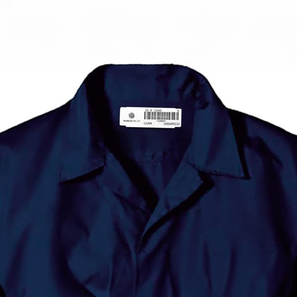 Button up shirt with ID tape situated on the inside collar with World Emblem Logo and barcode